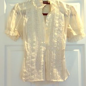 Bebe light cream button down blouse with design